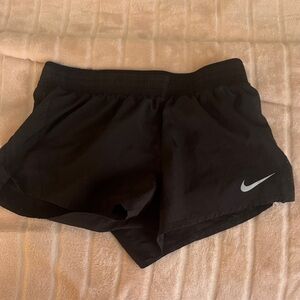 Nike Women's Black Athletic Shorts with Silver Logo